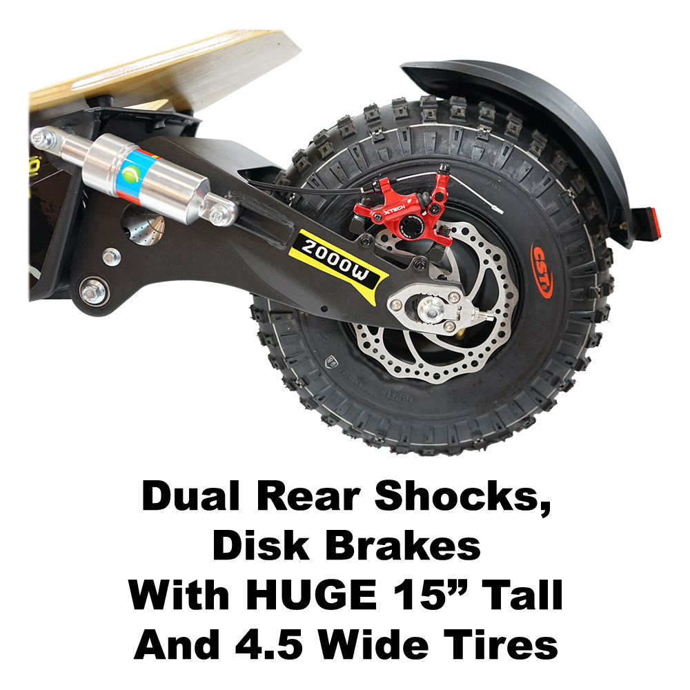 Dual rear shocks, disk brakes with huge tires measuring at 15 inches tall and 5 inches wide